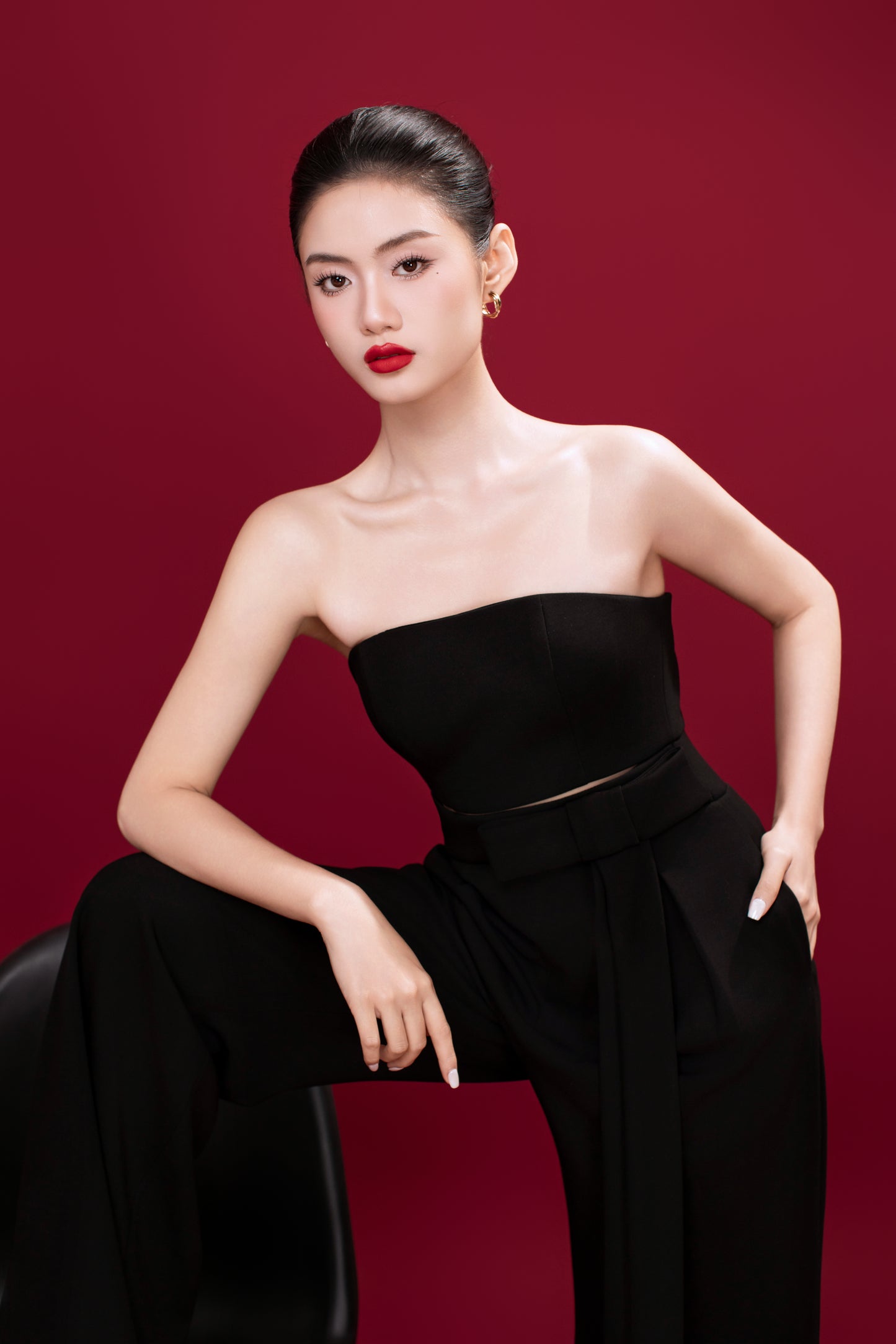 Close-up of Brooklyn jumpsuit neckline and structured bodice detail