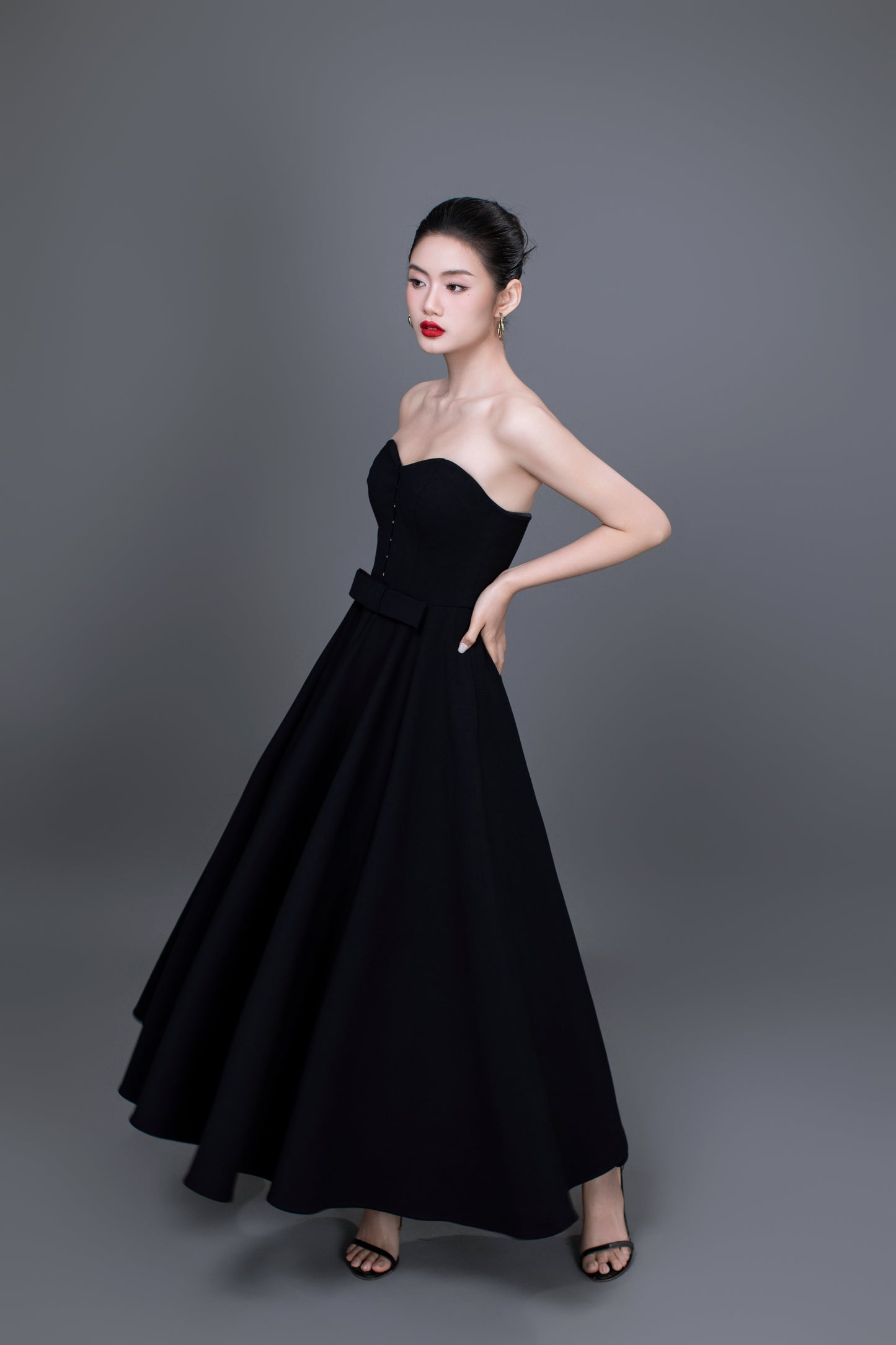 Model showcasing Diana dress worn as a party or wedding guest outfit