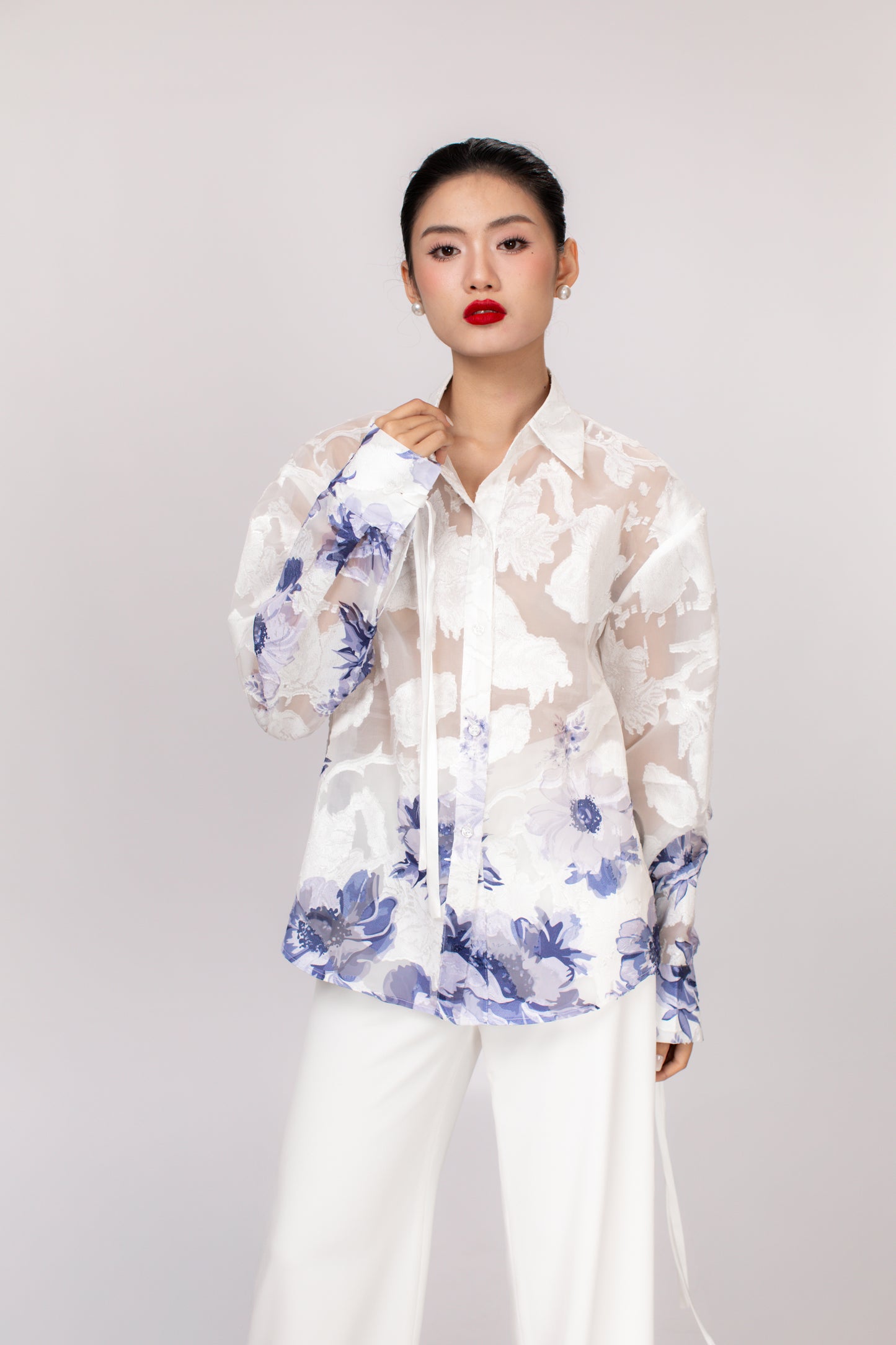 Front view of Hallie minimalist oversized women's top pairing with Freya wide leg pants in white color
