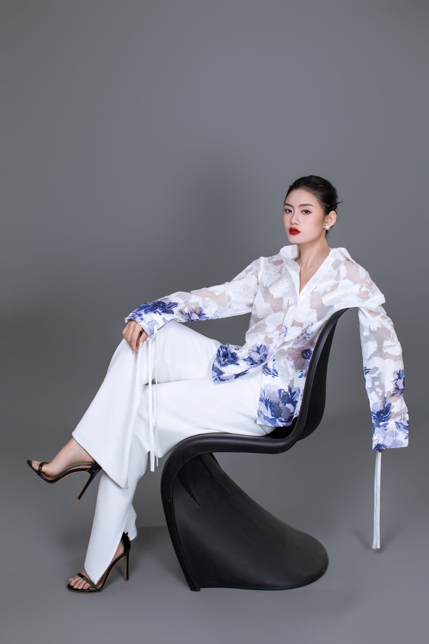 Model styling Hallie beige top with monochrome minimalist outfit