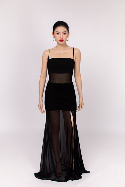 Detail shot of Dahlia dress side slit and soft fabric folds