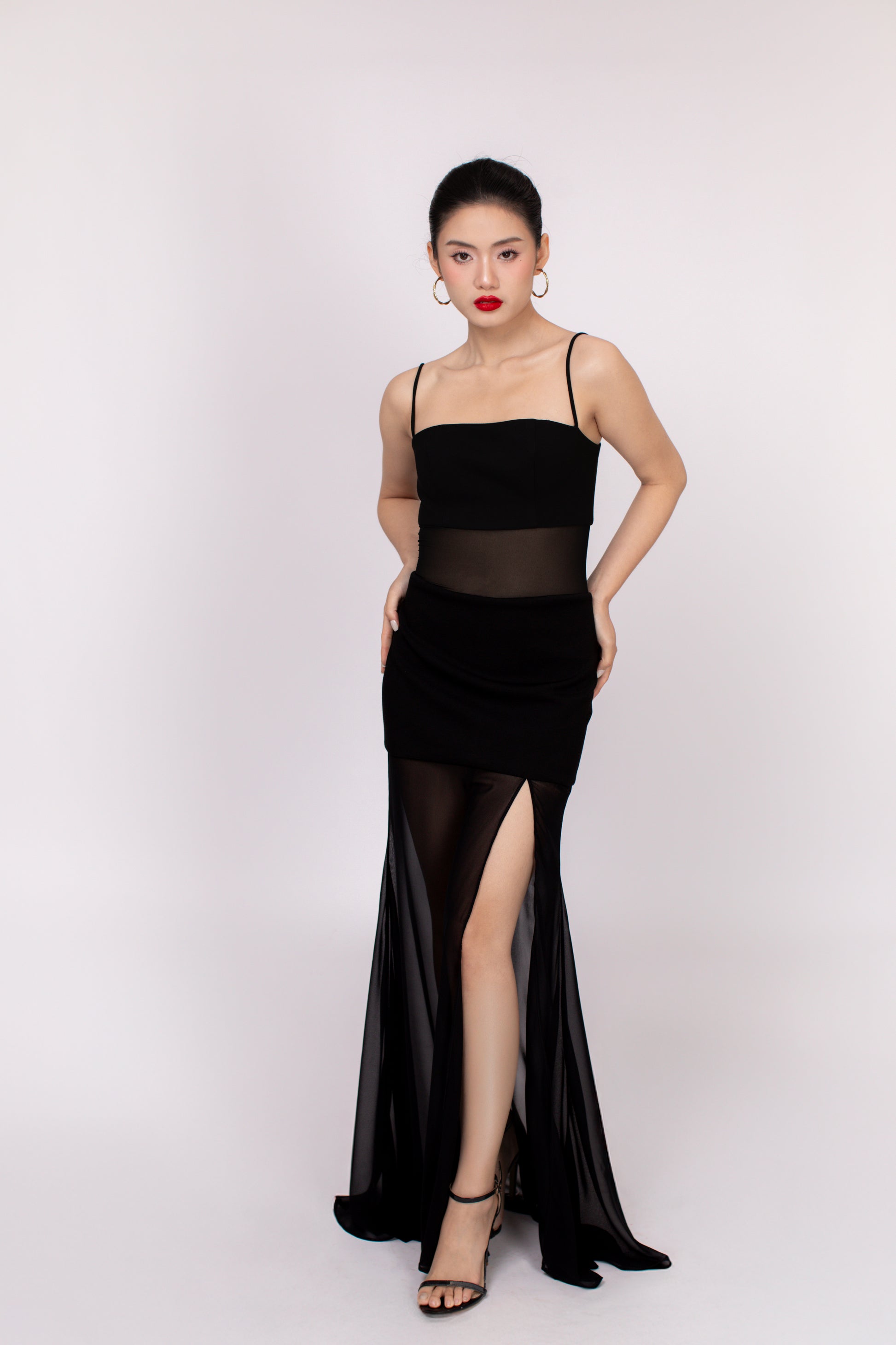 Dahlia dress styled with minimalist accessories for wedding guest look