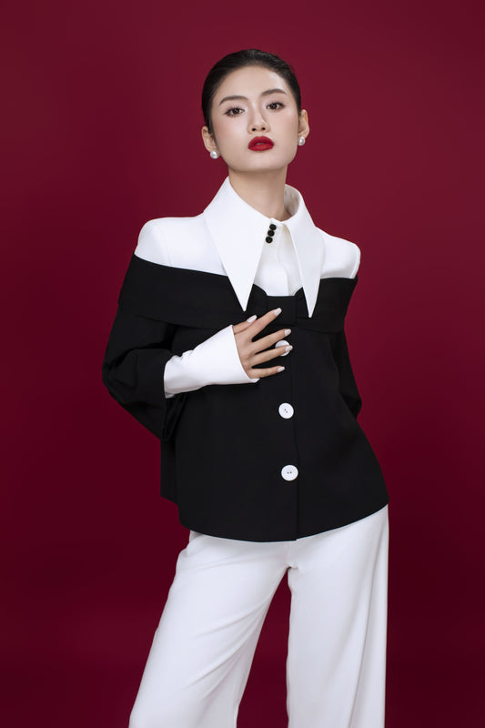 Front view of Grace minimalist women’s top pairing with Freya pants in white
